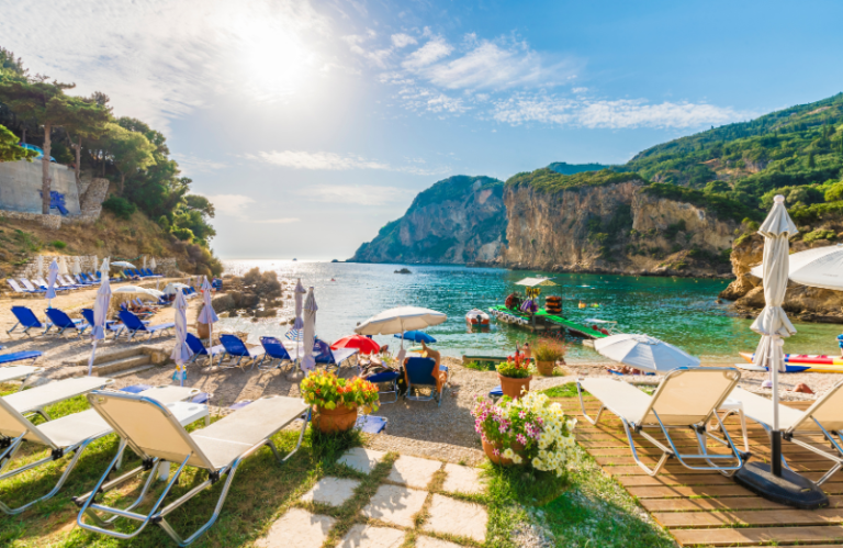 corfu beach with sunbeds