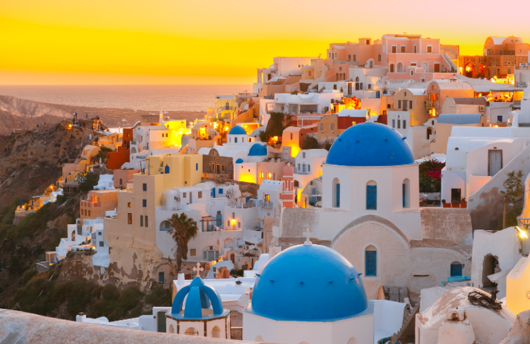 Santorini domed buildings at sunset